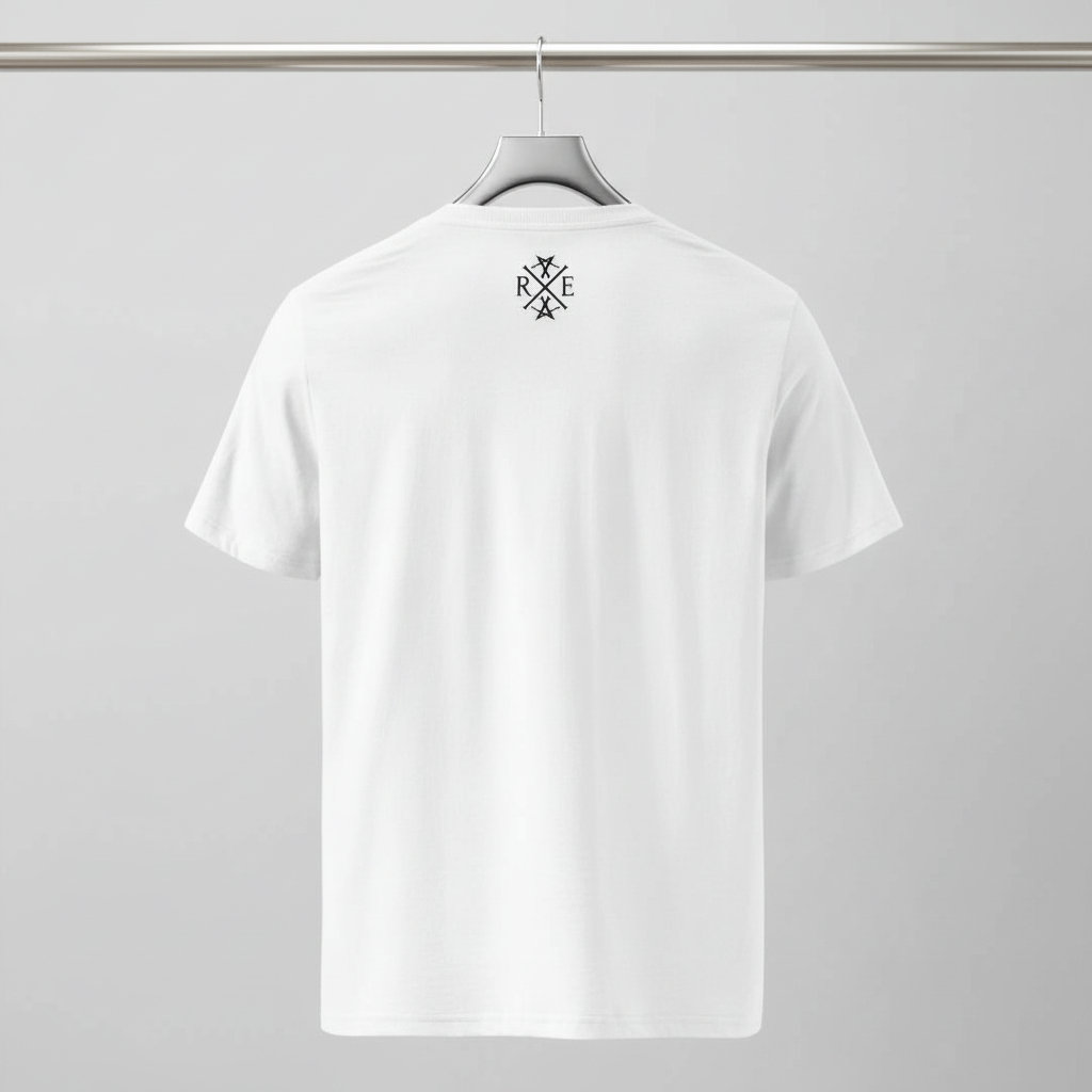 White oversized organic cotton t-shirt with black RAVIVE monogram logo at back neckline, hanging on silver hanger against a grey background.