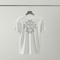 White oversized organic cotton T-shirt hanging on a chrome hanger against a light grey wall, featuring a large original RAVIVE monogram logo.