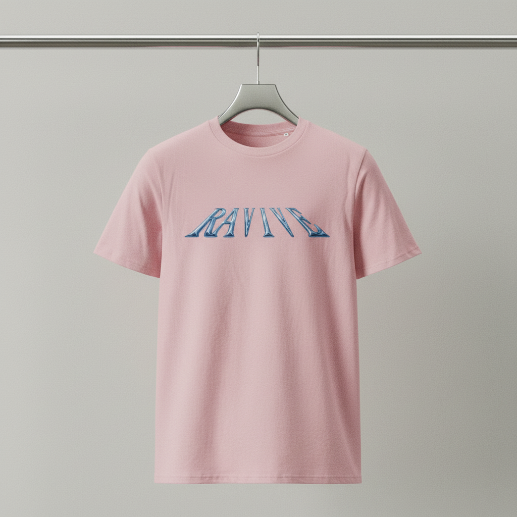 Oversized pink organic cotton t-shirt with blue chrome logo text across chest, crew neck, short sleeves.